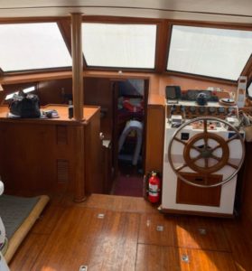 1986 President 37 Helm station in cabin inspected during marine Survey in Fort Pierce Florida