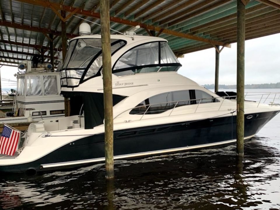 Blue 2008 Sea Ray Sedan Bridge 58 Dock Side at Doctors Lake Marina in Oragne Park Florida